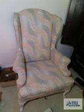 Floral print wingback chair on first floor