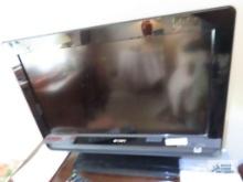 Sony Bravia, model KDL-26M4000, flat screen TV with remote and booklet