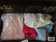 Variety of ladies nightgowns and belts