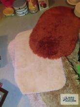 Assorted throw rugs