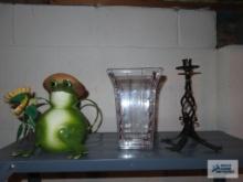 Metal frog watering can, plastic vase, and wrought iron candlestick