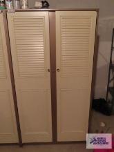 Two-door metal cabinet in basement