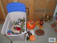 Halloween decorations and other decorations in plastic tote