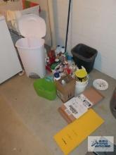 Variety of cleaning items, trash can, fold away shirt folders, etc