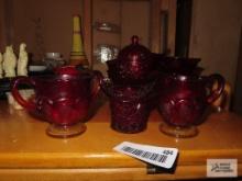 Cranberry glass creamer, sugar, and top hat toothpick holder