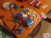 Happy toy harmonica, Lionel HO street lamp, miniature plastic toys, and bar items