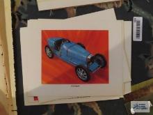 Assorted car prints with advertising pamphlet