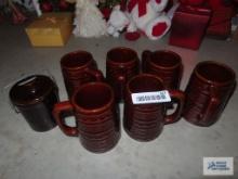 Brownware mugs and canister with locking top