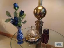 Glass cat figurine, Delft miniature vase, and flower arrangement in glass jar