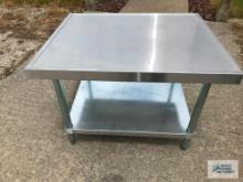 STAINLESS STEEL TABLE. 30"x 36"x 24".
