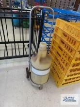 Fuel jug with cart