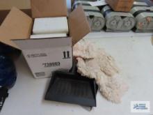 Various cleaning items and dust pans