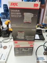 Three Skil finishing sanders in boxes, model HD7575