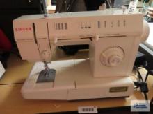 Singer model 5825C sewing machine with pedal controller