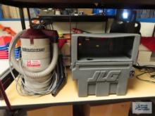 Minuteman commercial backpack vacuum with JLG battery holder