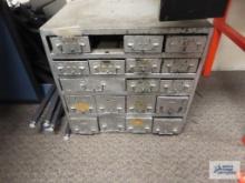 Hardware cabinet with hardware. Very heavy. Bring help and floor dolly for removal.
