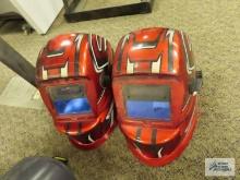 Two automatic welding helmets