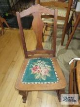 Vintage needlepoint seat rocking chair.