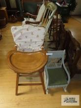 Wooden high chair and woven rocker, needs repaired.