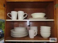 Variety of plates, bowls, and mugs