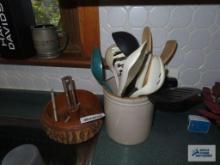Crock with utensils and nut cracker with bowl