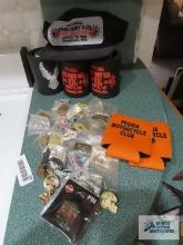 Can koozies, Fred Perry benefit run hat and pins, Harley Davidson pins