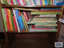 Children's books on middle shelf