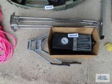 Black & Decker air station and wall hanging bike and other hooks.