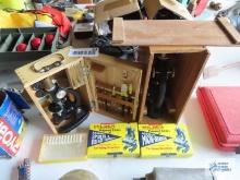 Two microscopes in cases with slides.