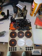 Midland walkie-talkies, flashlights, headlights, and reactive target spots.