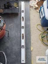 Vintage wooden level and aluminum level