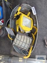 Work lights and metal bucket