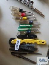 Nut drivers, screen tool, utility knives, and punches