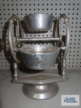 Hammered aluminum and glass rotating condiment set