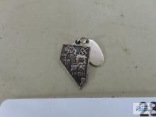 Silver colored pendant, Las Vegas, Nevada, marked Sterling