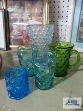 Variety of colored glassware and toothpick holder