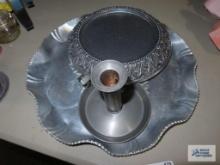 Aluminum serving platter, metal candlestick, and decorative candle holder