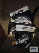 Two pairs of Bauer ice skates. No sizes