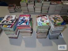 Four stacks of football cards