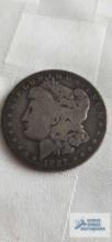 1887 Morgan one dollar coin, marked O