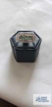 Silver colored ring with green (Emerald) and clear (CZ) gemstones, marked 925 5.4 G, size 9.5