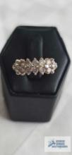 Gold colored ring with clear stones marked 14K (double row wedding ring 1 ct total weight) 3.8 G.