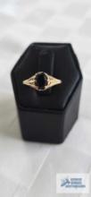 Gold colored antique black stone ring, marked 10K, 1.8 G, size 6.5