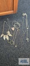 Costume jewelry necklaces, bangles, bracelets, earrings, and rosary