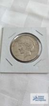 1923uncirculated peace dollar coin, marked D