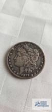 1881 Morgan dollar coin, marked O