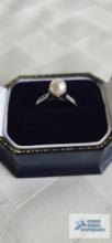 Silver colored ring, marked 14K with pearl and clear gemstones, .08 ct diamond, 5.5 mm pearl, 6.2 G,