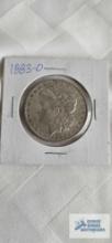 1883 Morgan dollar coin marked O