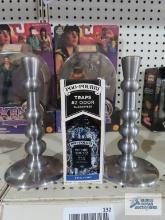 Heavy stainless steel candle holders and Poo-Pourri royal flush