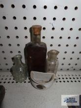 Antique bottles and comical half mug made in Japan